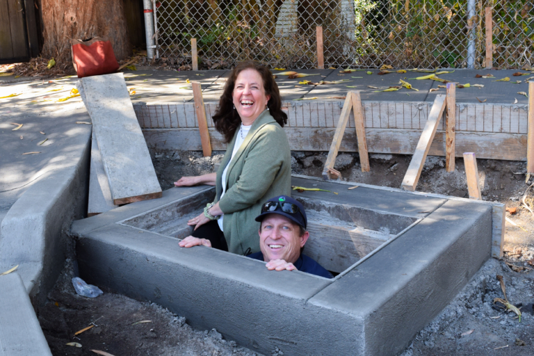 Dr. Therese Peffer and Keith O’Hara at the EcoBlock stormwater facility construction site.