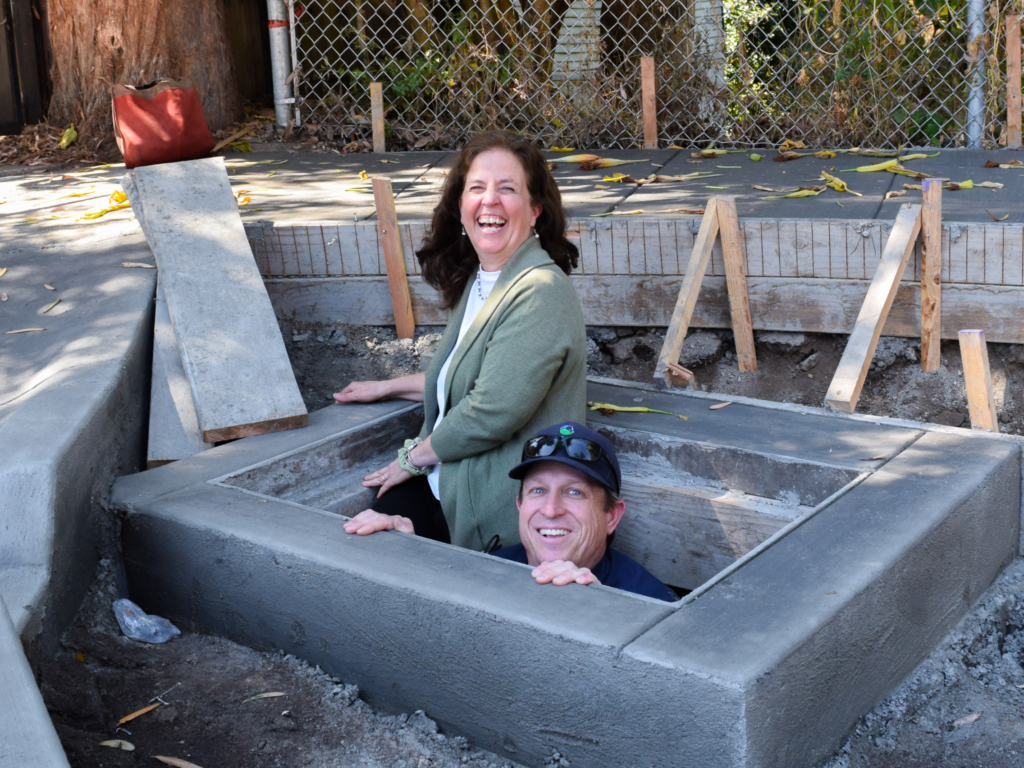 Dr. Therese Peffer and Keith O’Hara at the EcoBlock stormwater facility construction site.