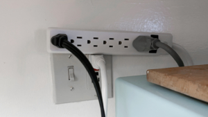 An inactive power strip with two cords attached