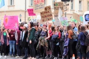 A crowd of young people protesting against climate change.