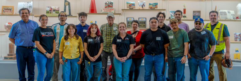CREL Student Researchers and Faculty standing in a row in a Bakersfield College display room